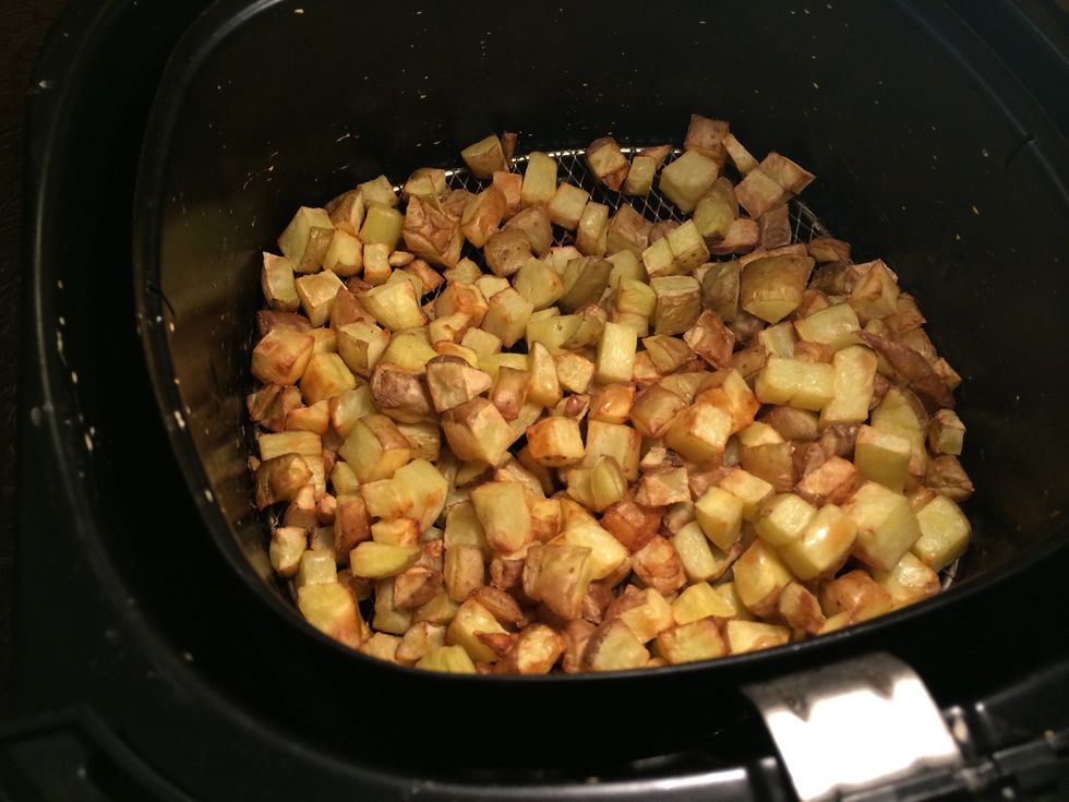 Air fry the cubed potato.