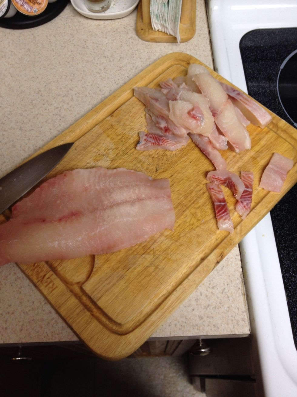 Alice the catfish into thin strips.