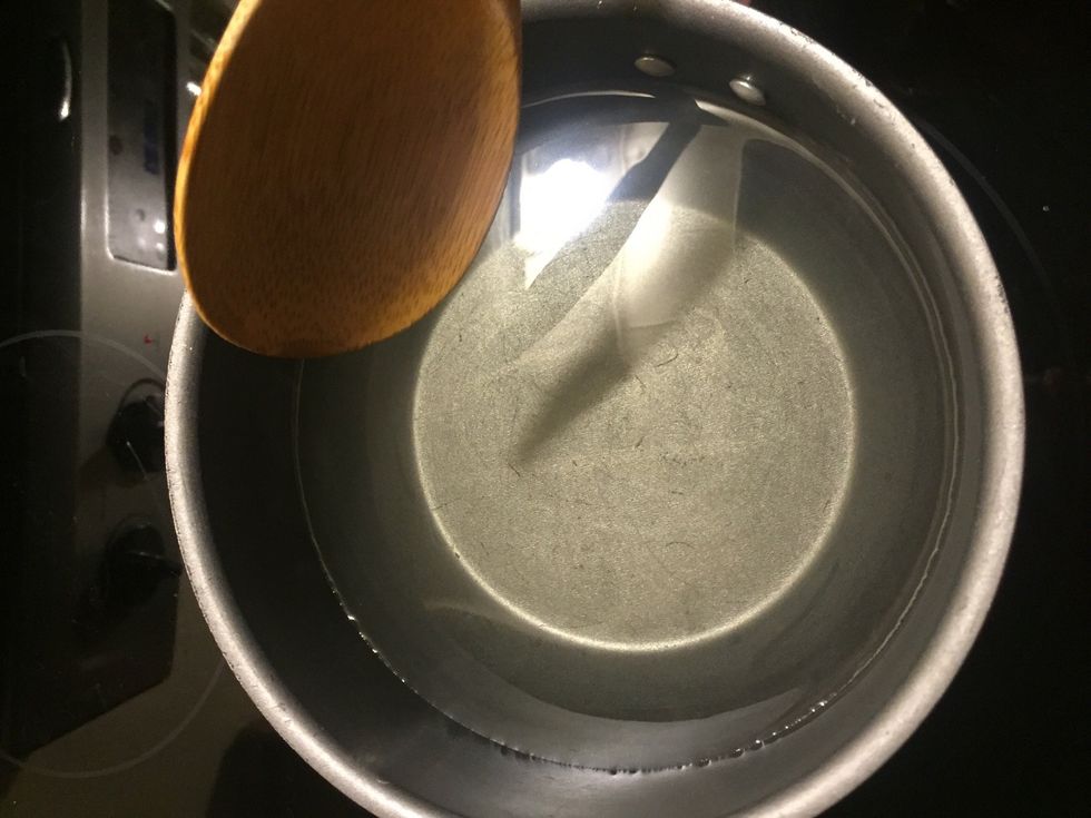 All dissolved! From this point you don't need to stir anymore. Just leave the water/sugar mix on the stove until it comes to a boil.