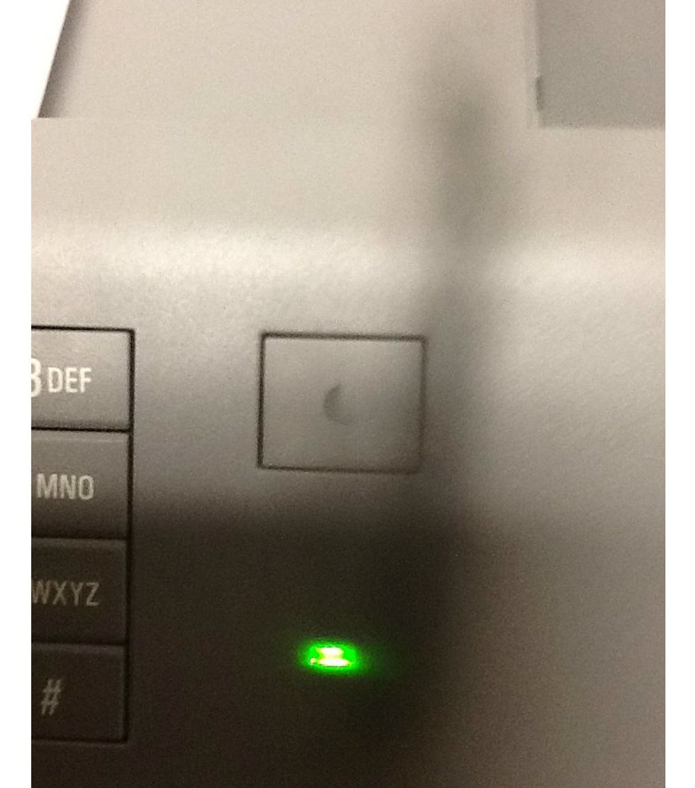 All documents that were printed will proceed to print and you will be able to log out of the printer at this point. The green indicator light will appear. The printer should function properly.