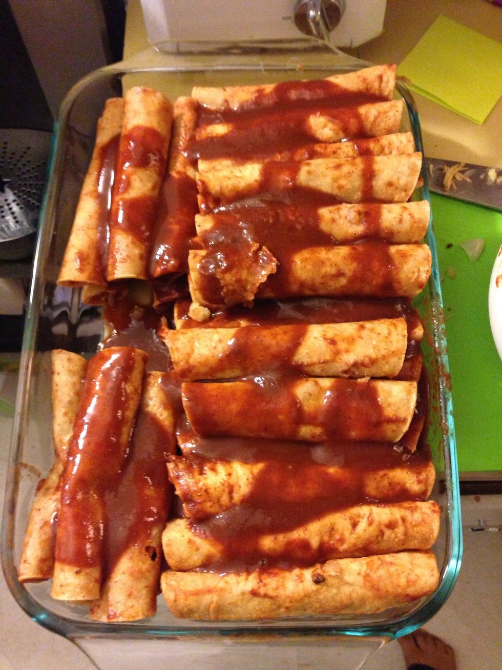 All done. Add some sauce to the top but also set some aside to add at the end if you want to. Have your oven preheated to 350 degrees. Cover with foil and warm for 20-30 minutes.