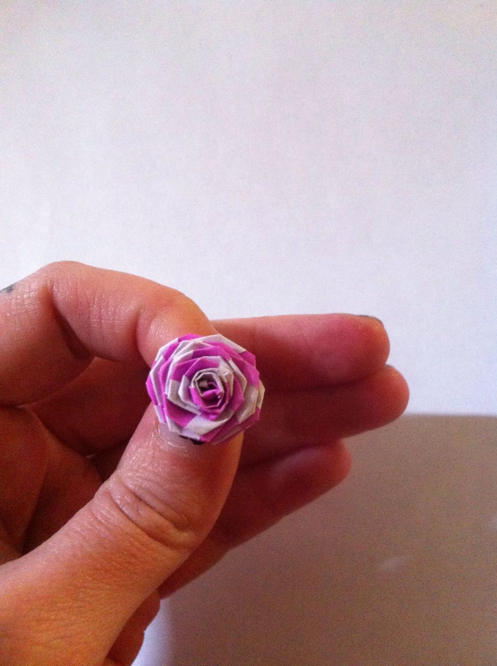 All done. So cute & tiny. You'll be surprised by how quick they are to make! You can glue your handle down on the back to keep it from falling apart or glue a bunch together for bouquet!