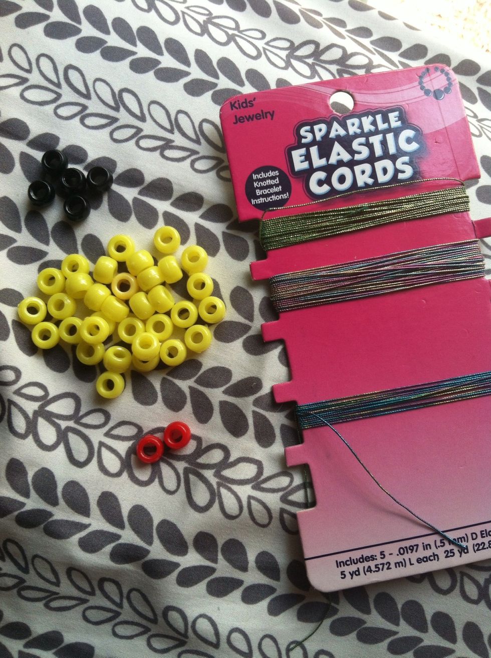 All of your supplies ^.^ 33 yellow beads 5 black beads 2 red beads
