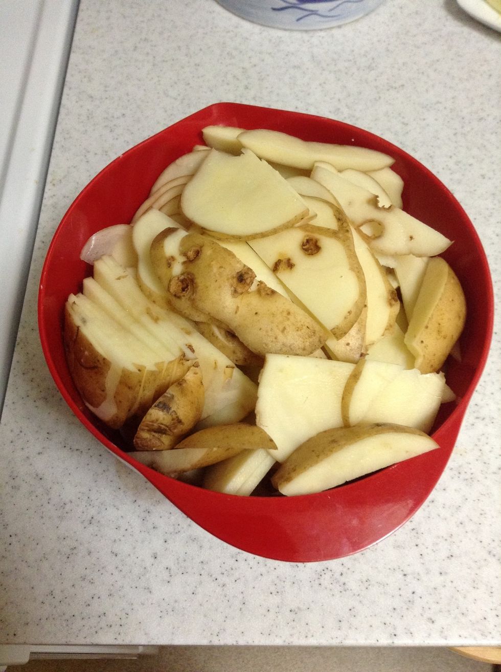 All the potatoes sliced and halved
