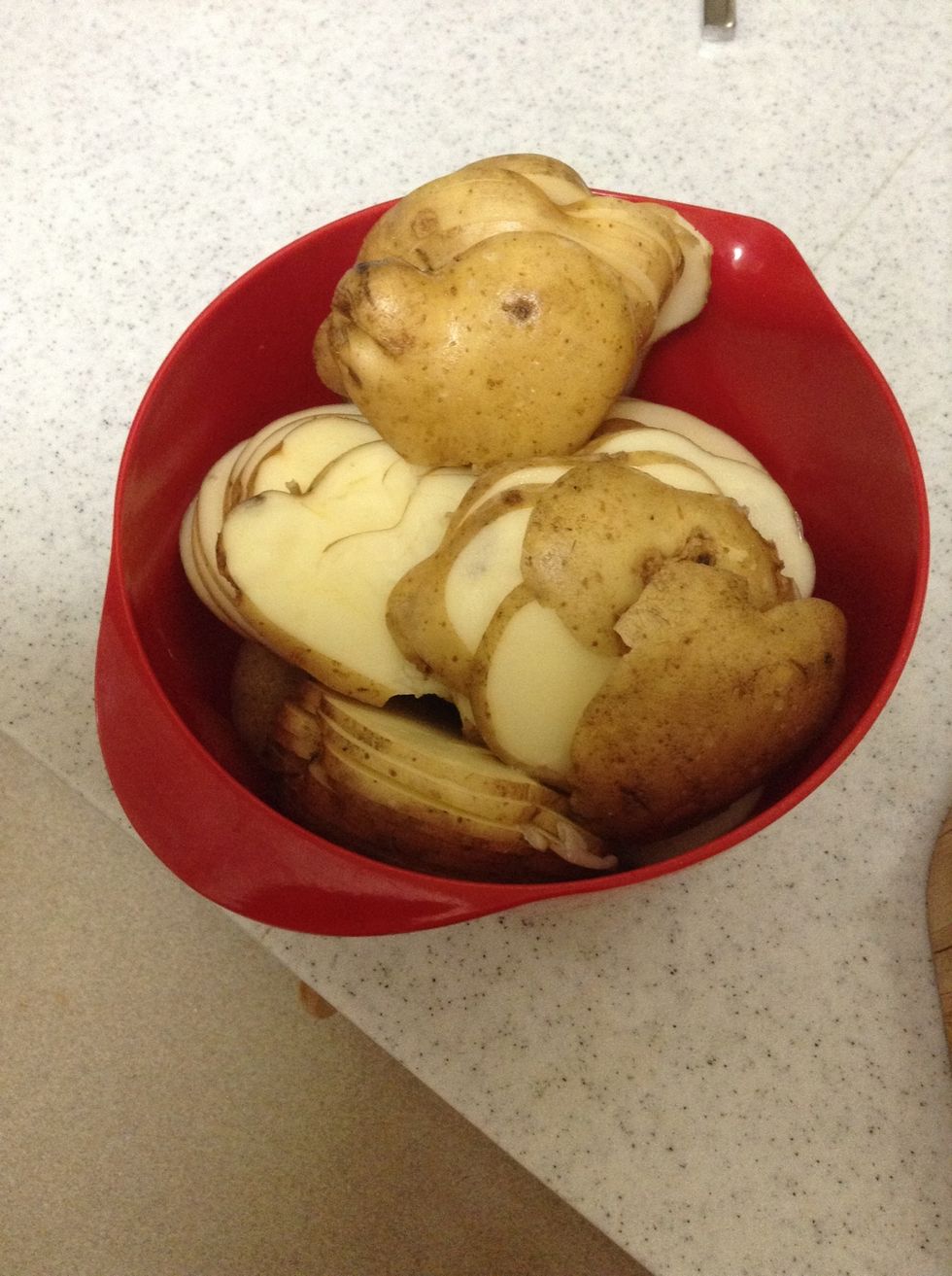 All the potatoes sliced up