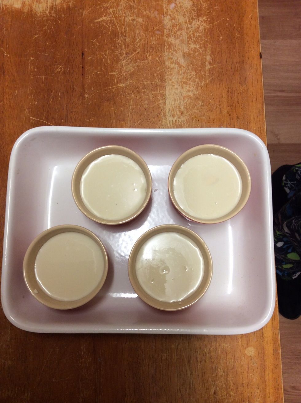 All the ramekins with the mixture in them