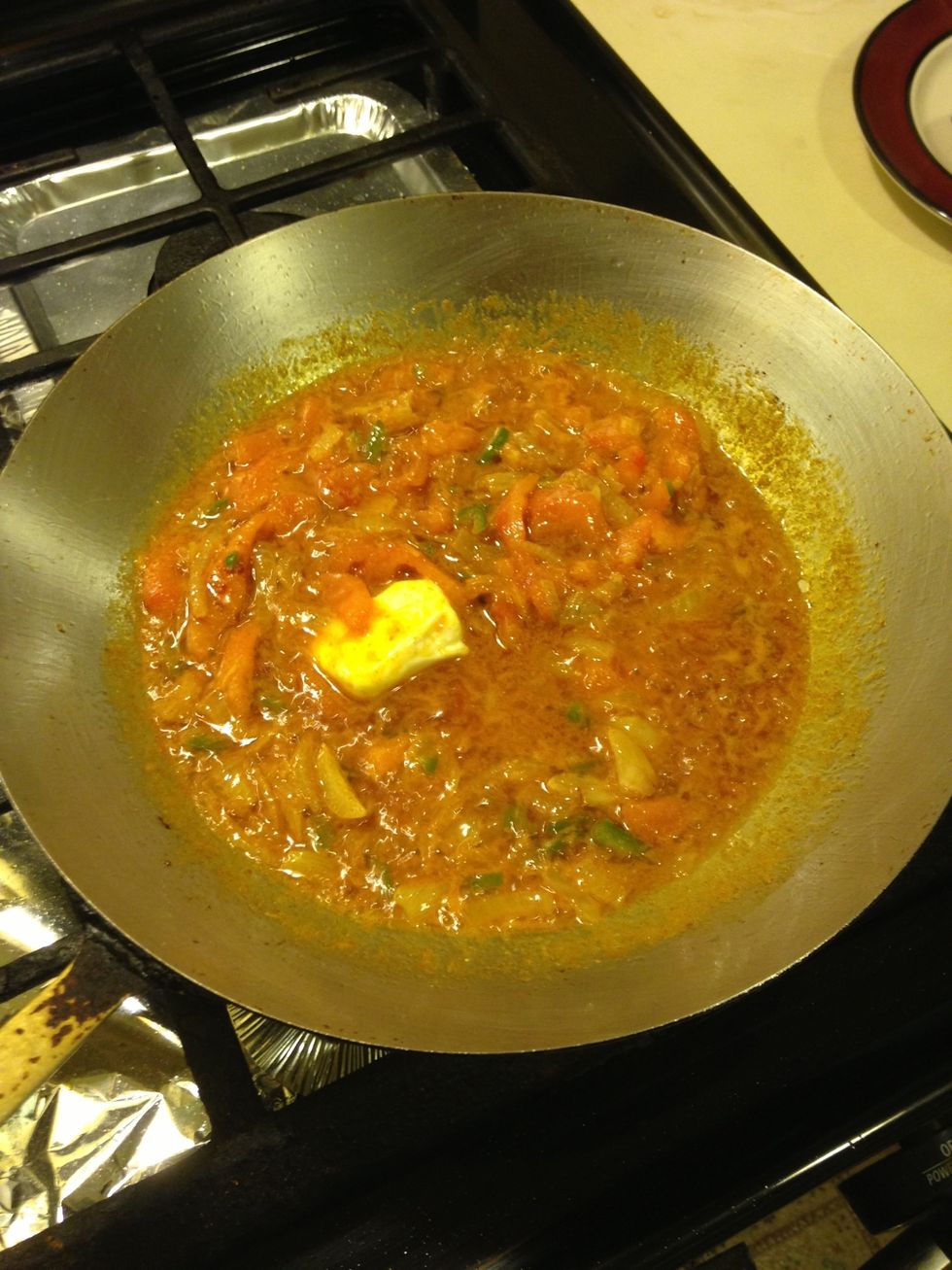 All the spice mix into the pan with a tablespoon of butter.