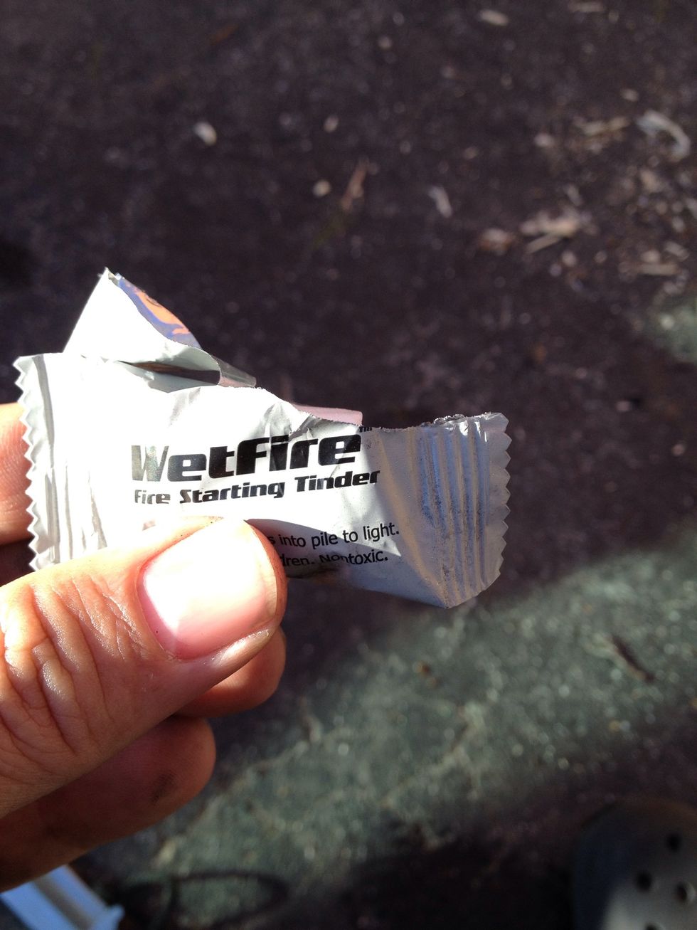 All you have to do is just tear at the corner. I would recommend not opening too much so you can put the left over wet fire in the pouch.