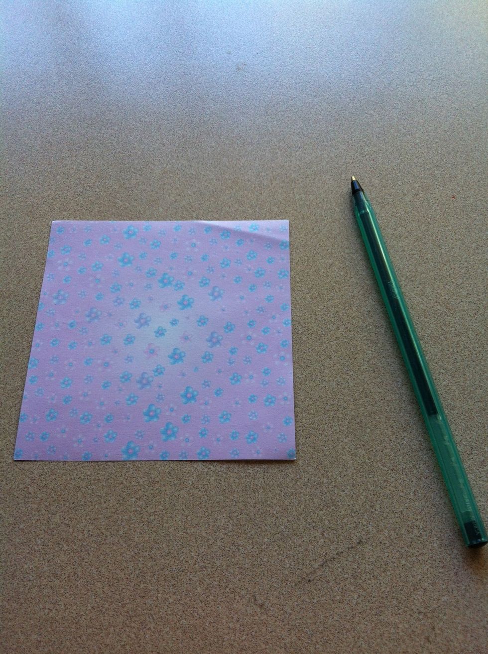 All you need is a piece of decorative or plain reasonably square piece of paper and pen to write with