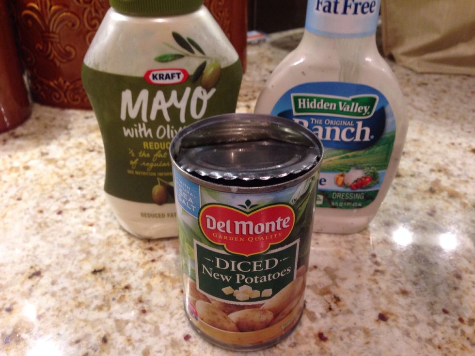 All you need is canned diced potatoes, your favorite salad dressing, and some mayo.