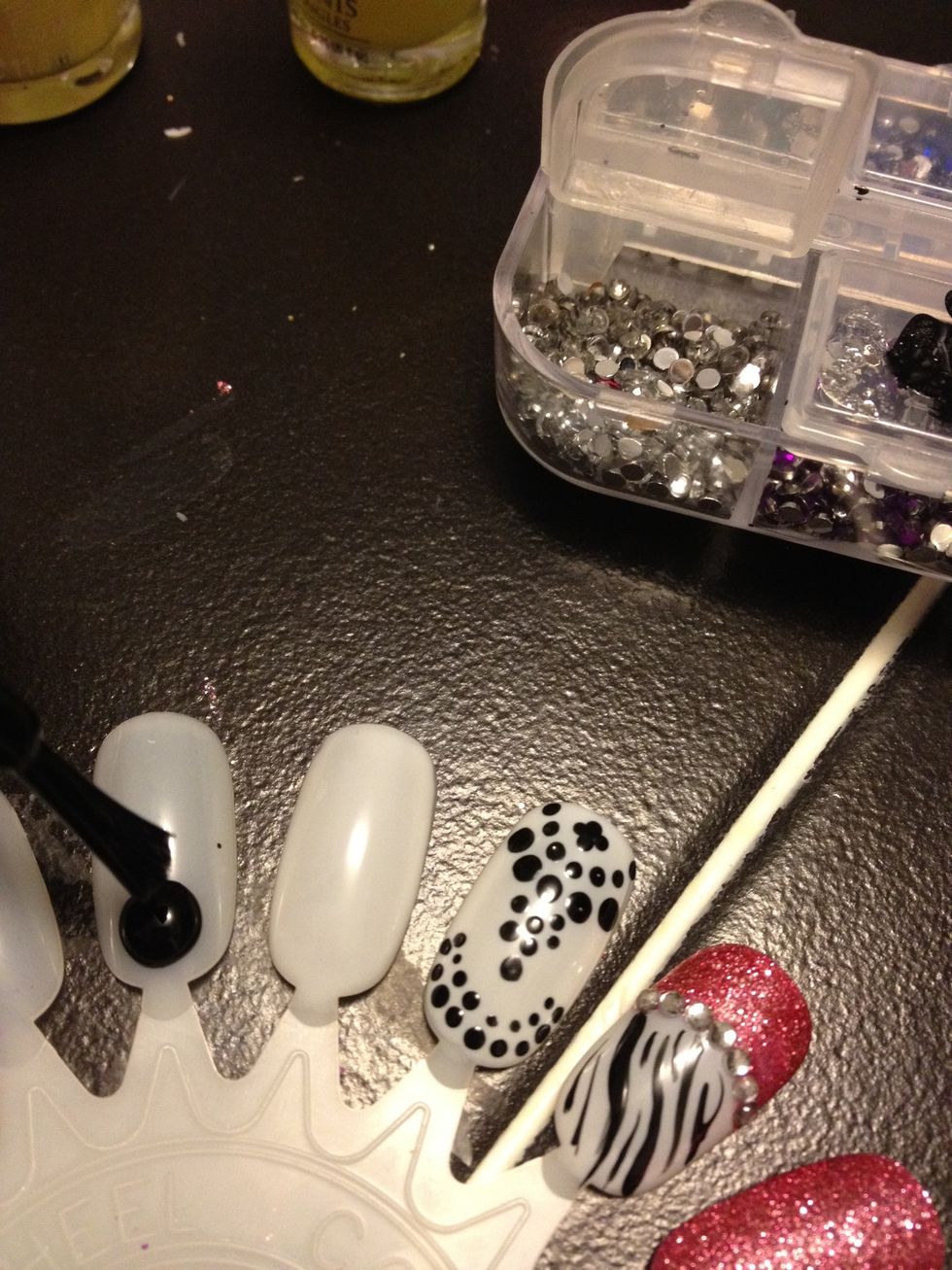 Allow a drop of polish to fall at the bottom of your nail