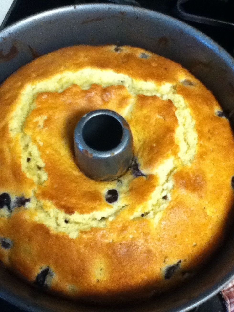Allow cake to cool in pan for 30 mins, then run a sharp knife around the edges and invert into a plate.