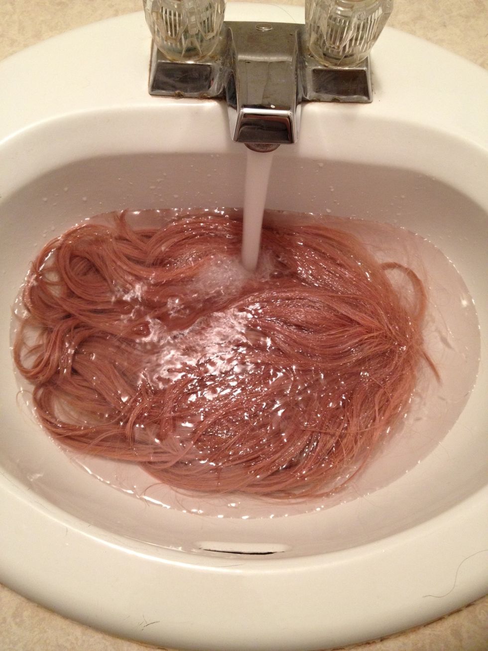 Allow it to soak in clean water for a minute or so.