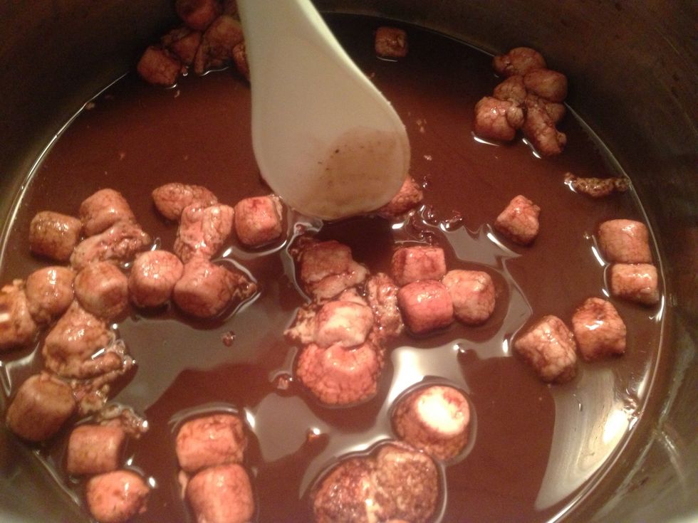 Allow marshmallows to melt. Stir often.