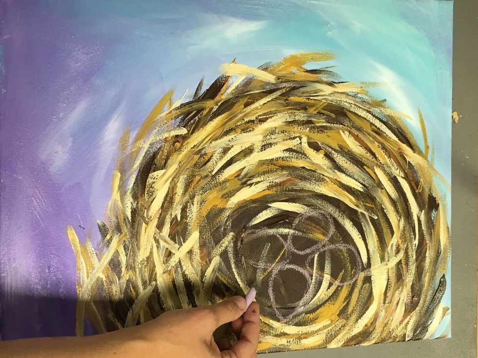Allow that to dry for a few minutes, or break out the blow drier. Use your chalk to draw a few egg shapes. Make sure they are all the same size. I drew four, you can draw 2 or 3 or 4.