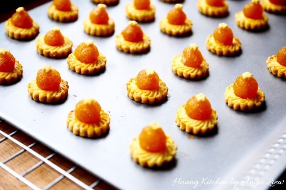 Allow the pineapple tarts to cool on baking tray for about 5 minutes.