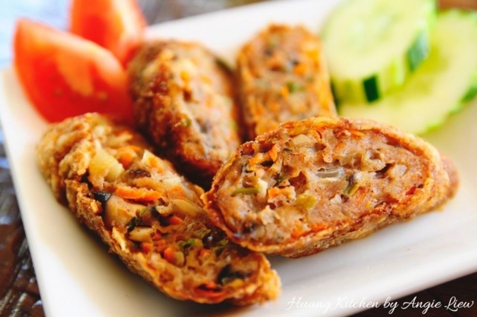 Allow to cool slightly before slicing with a very sharp knife and best served hot. For more details, visit http://www.huangkitchen.com/chinese-meat-rolls/ As always, ENJOY!