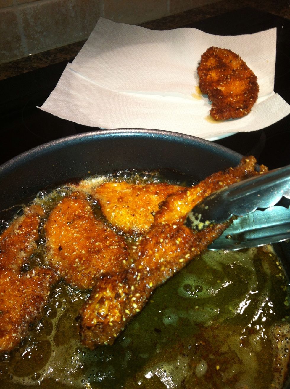 Almost there... Time to take out the first batch. Place on a paper towel to soak the extra oil. Keep an eye on the middle piece it is usually the first to be ready.