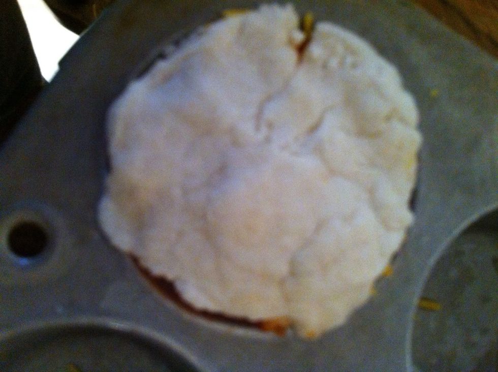 Also add cheese then place dough on top