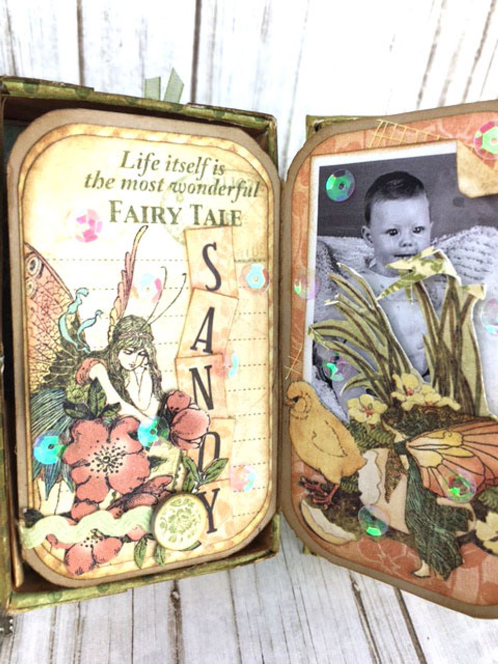 Also add photos on some of the pages along with fussy cut elements and other decorations.