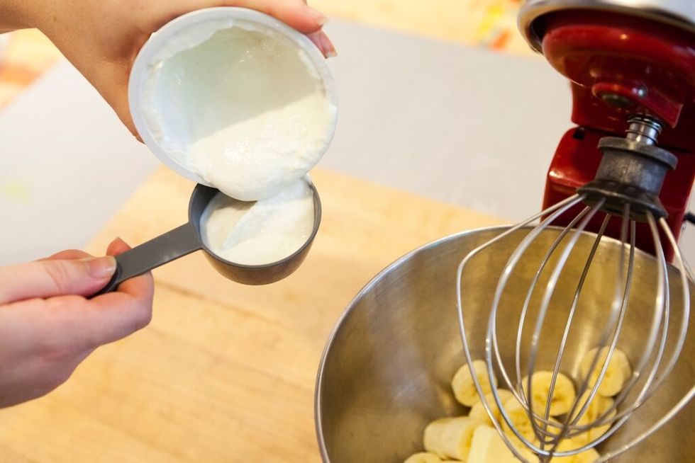 Also add yogurt and sugar to bowl.