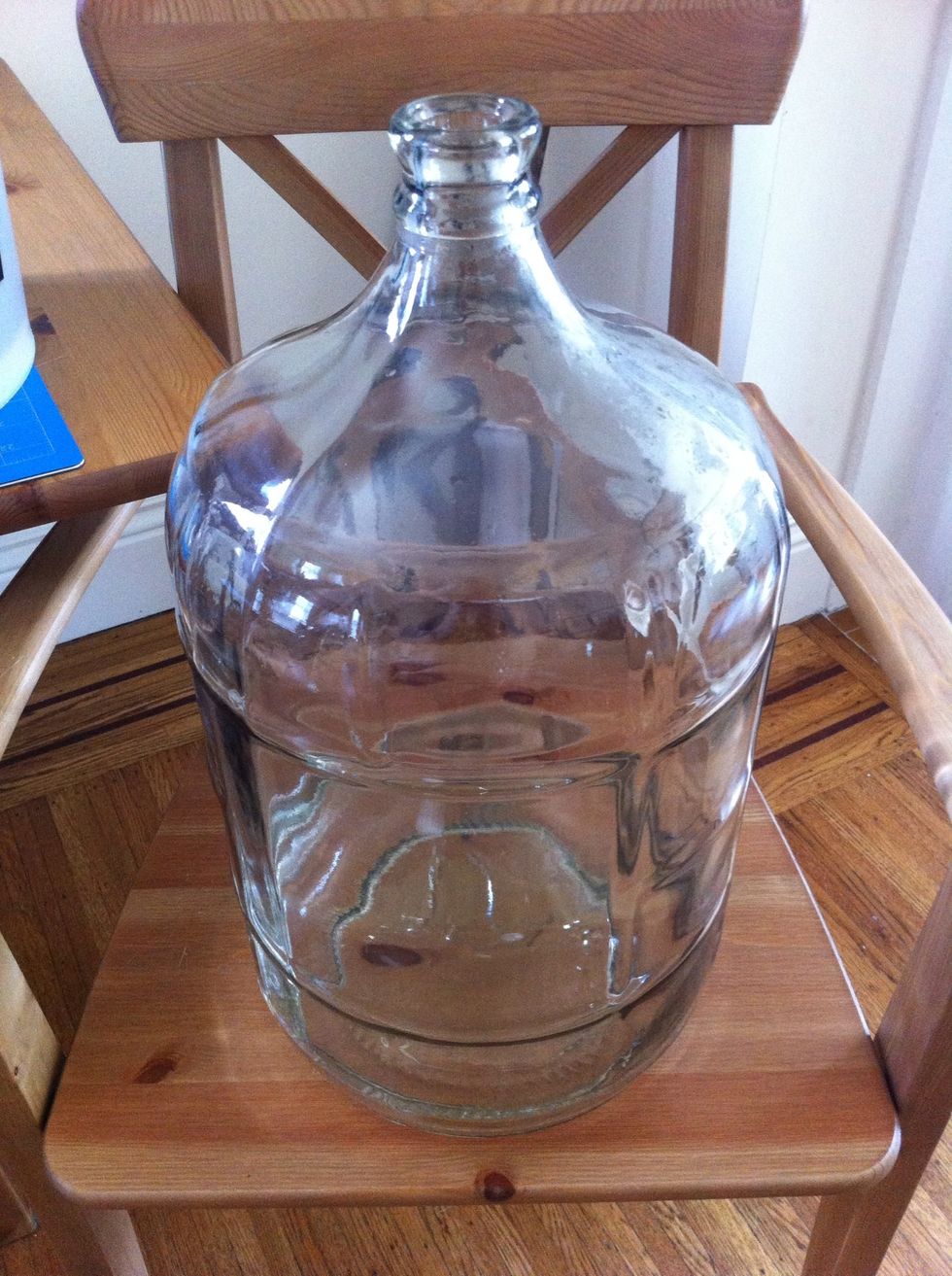 also fill your carboy ( secondary fermentation bottle ) with a gallon of hot water. put a teaspoon of sanitization solution in it as well. shake it around to get it all sanitized in there.