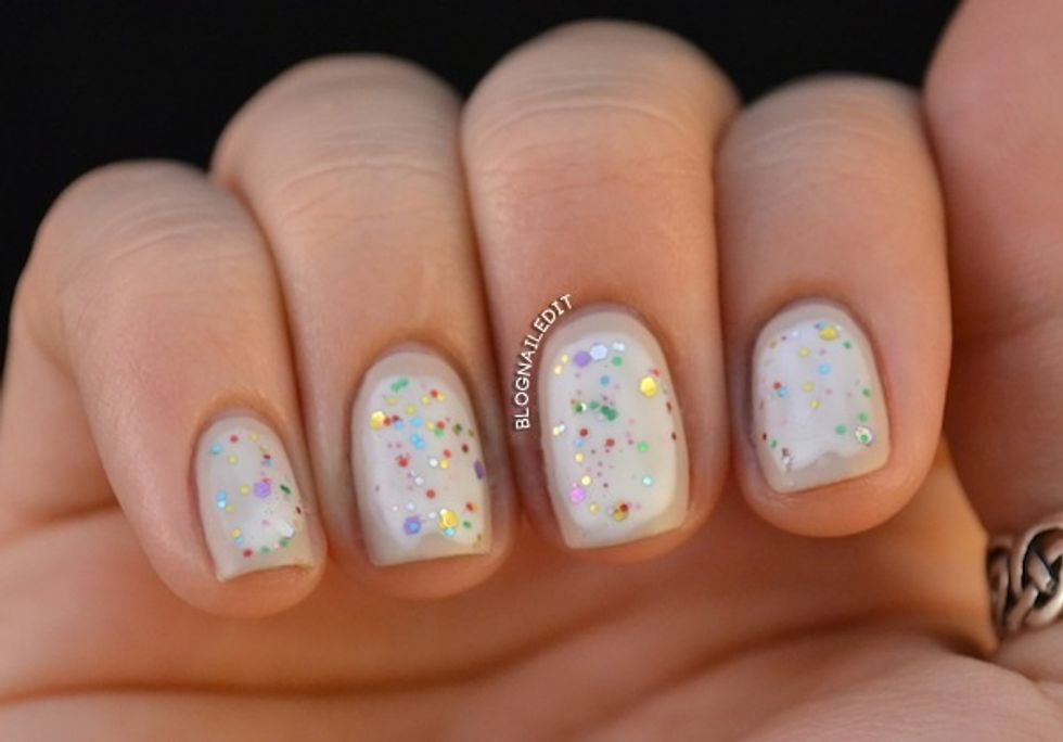 Also here is an adorable Pop Tart mani I found online, so I want to do a tutorial on it tomorrow. You will need a very light brown polish White polish And MULTI colored glitter clear polish.