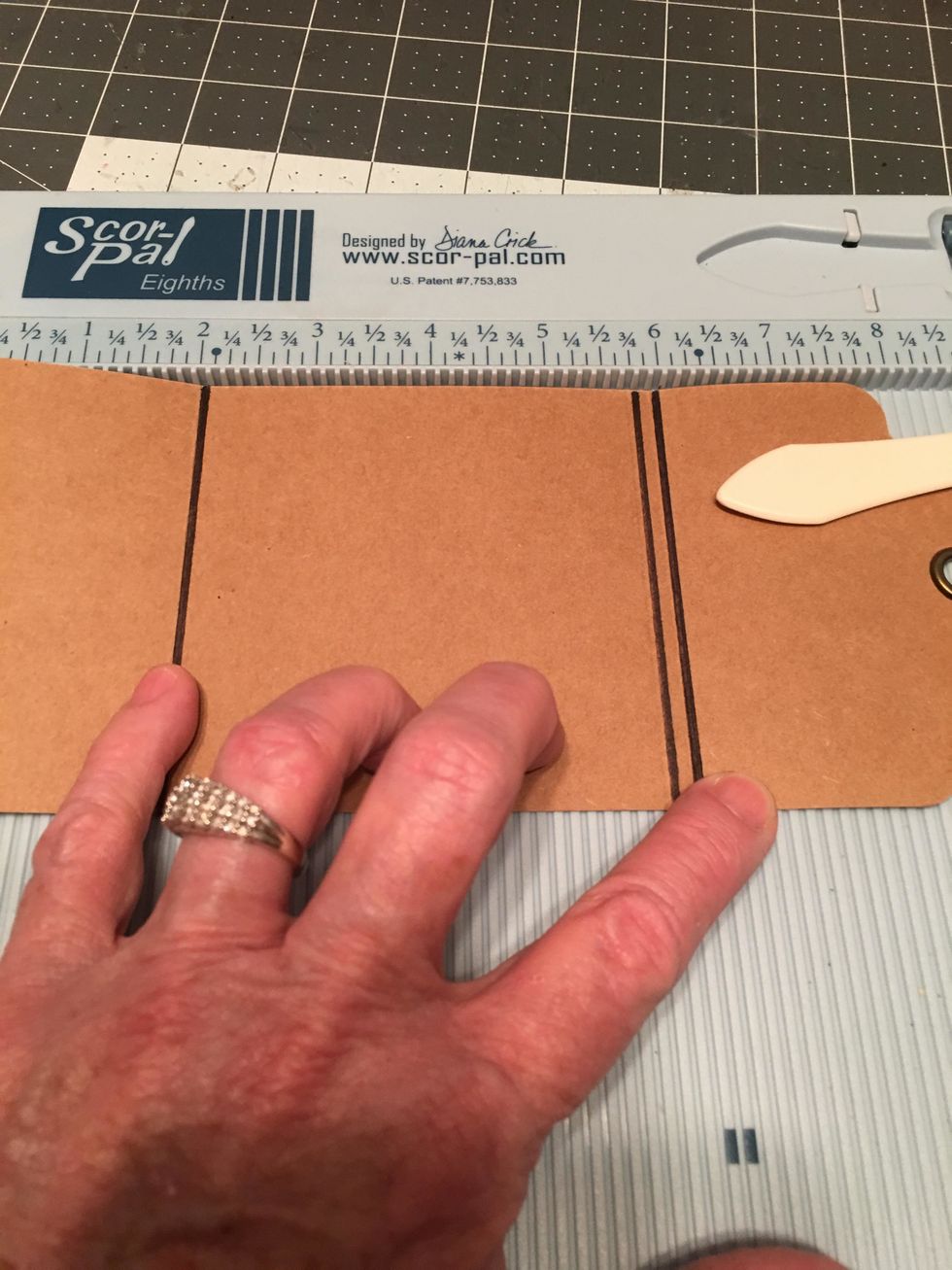 Also make a score line at 5 3/4" as shown in this photo. I marked my score lines with black pen so you could easily see all three score marks.