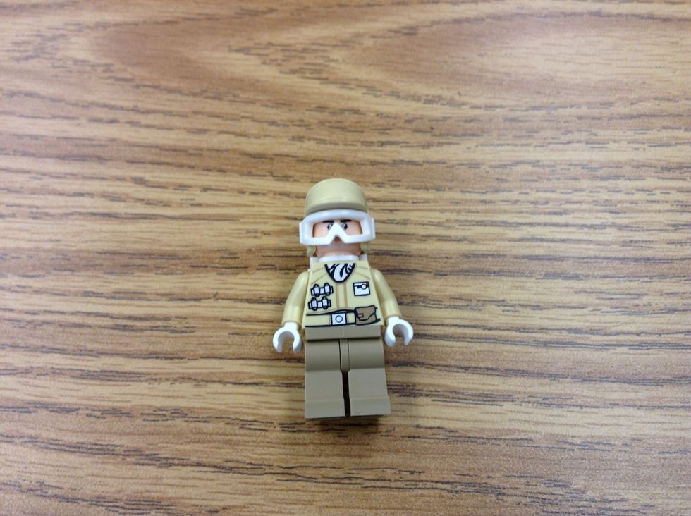 Also, put the hat or hair on the figure.