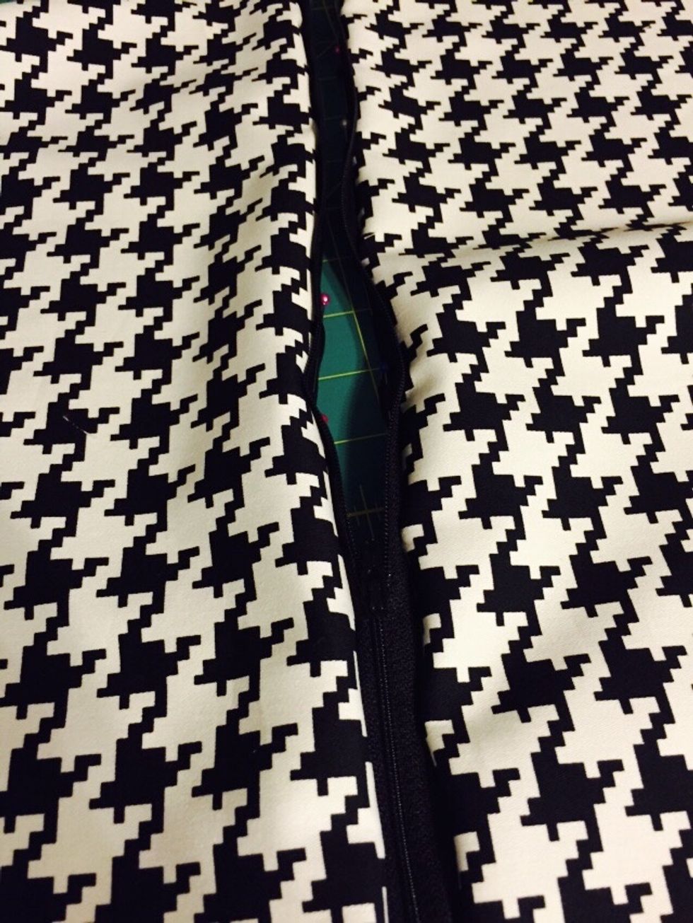 Also test your zipper to make sure that it is working properly before sewing it to each side of the fabric.