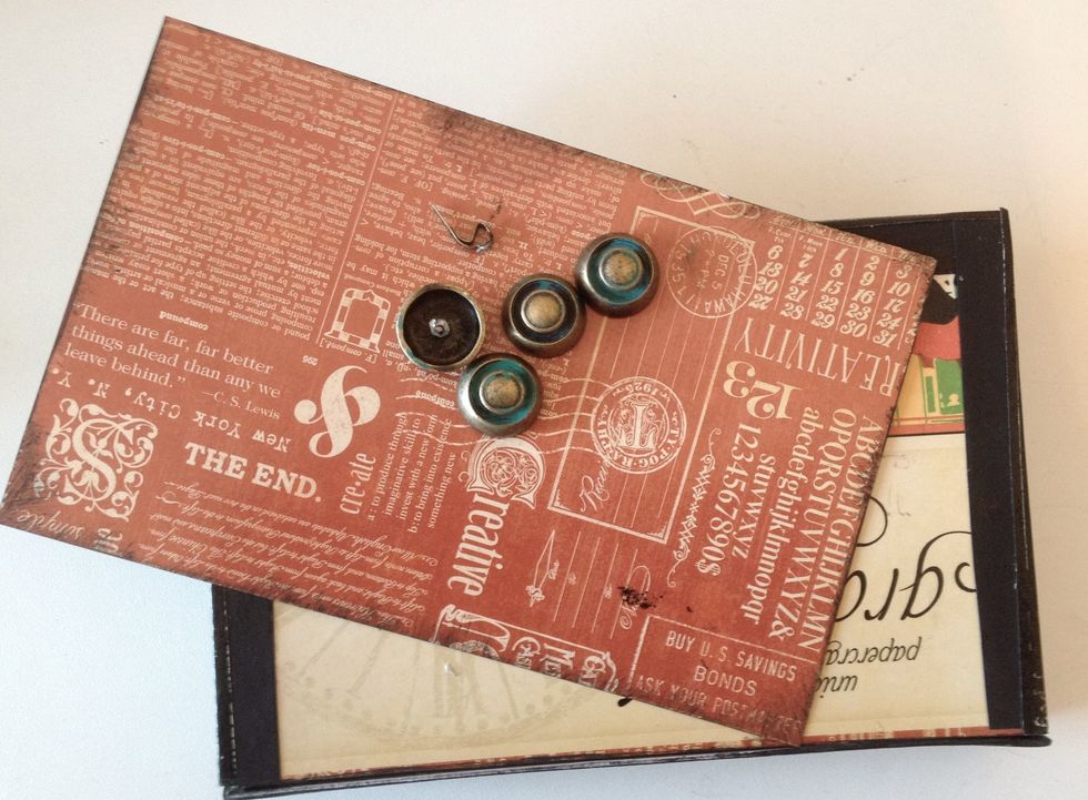 Also took some cover paper from the paper pad under the bottom and glued on metal button feet.