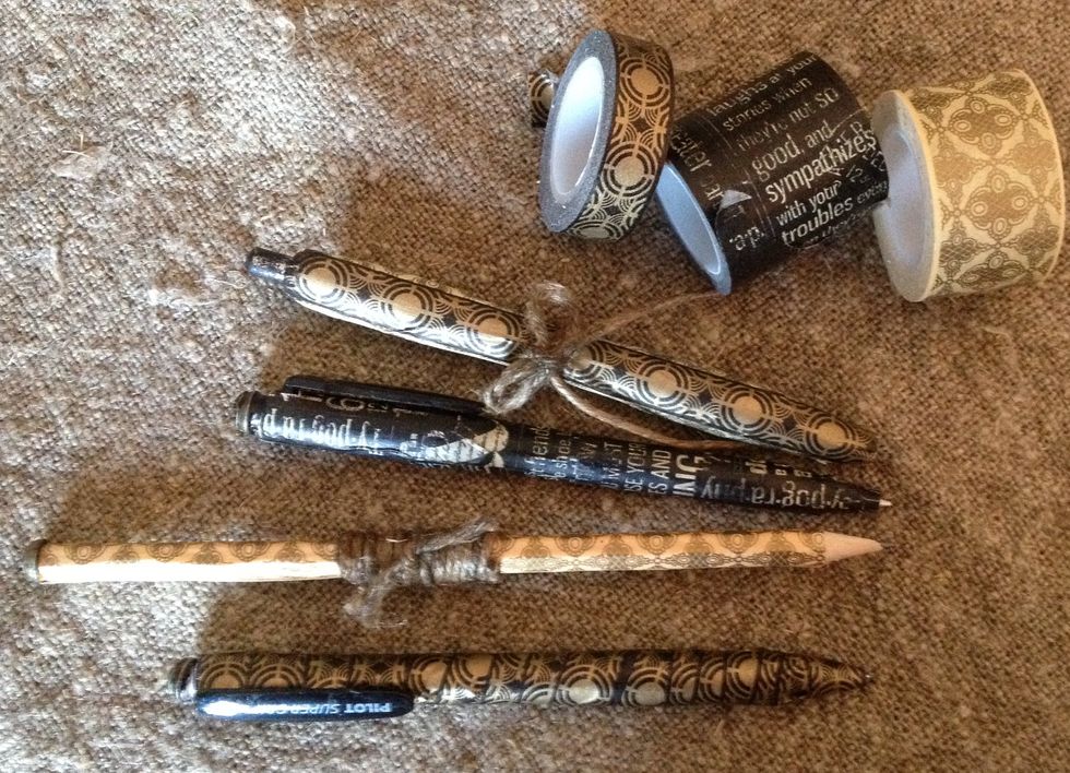 Altered pens with washi tape.