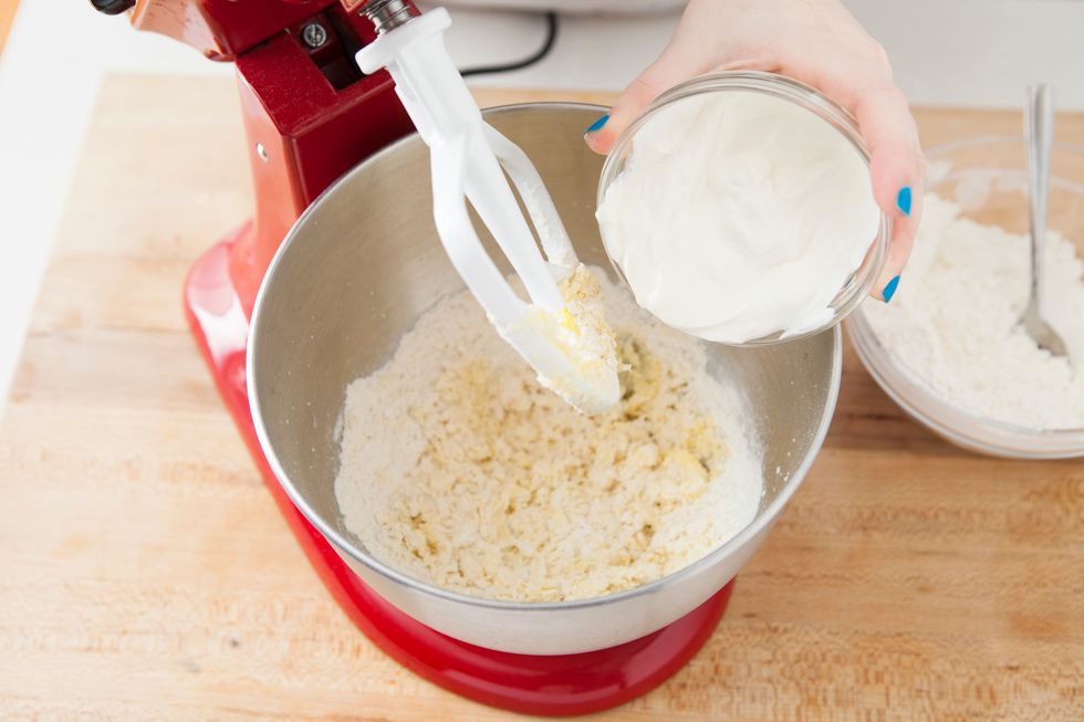 Alternate with the sour cream and end with the flour. The dough will be thick and sticky. Cover with plastic wrap and chill dough for 1 hour.