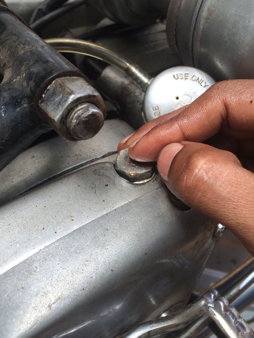 Always hand tighten bolts and then use spanner to torque bolts gently by feeling for tightness. Note : Over tightening bolts on engine casings made of aluminium are very easy to strip threads.