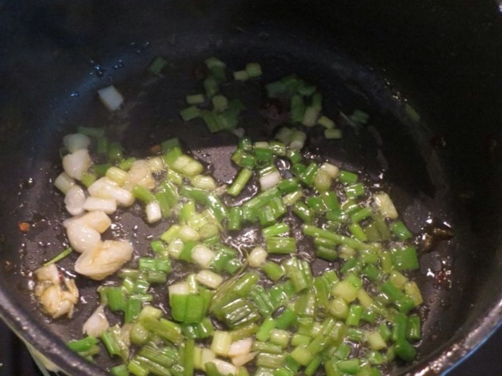 Always start with frying spring onion which will bring the lovely smell.