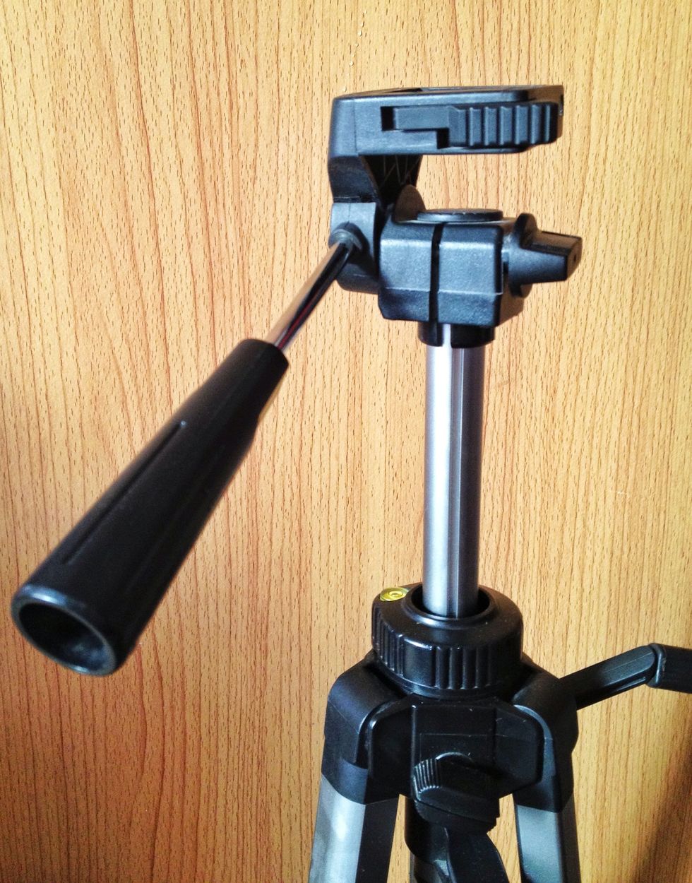 Am using this cheap camera tripod and it comes handy when u feel like a rockstar singing  with a mic stand on