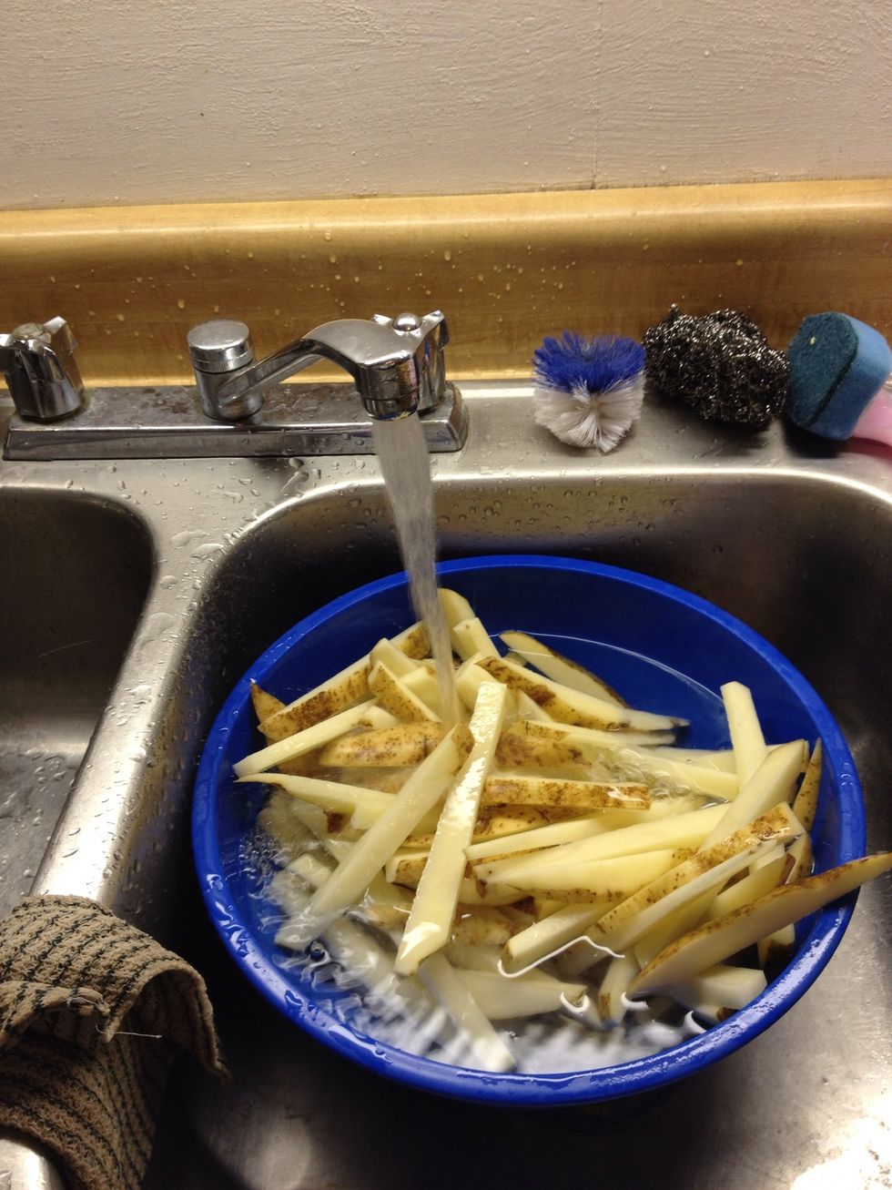 America's Test Kitchen has taught me that washing cut potatoes is a good thing to do so the starch doesn't make them sticky. (Best cooking show ever, FYI.)