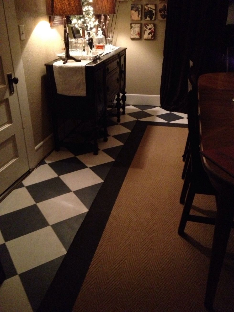 An easy, super cost effective flooring technique to get us by until the remodel!