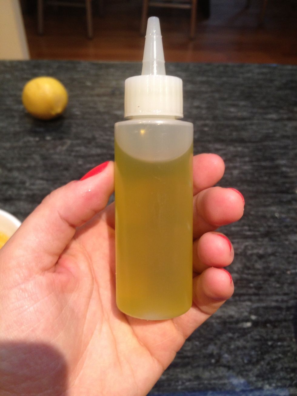 An easy way to swirl olive oil on top of soup is to use a small squirt bottle like this one.