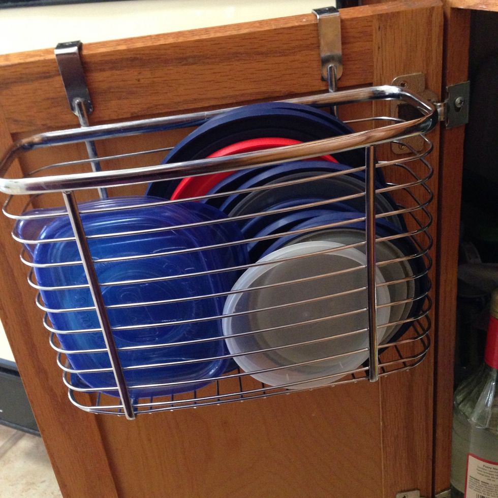 An over the door organizer i use to store lids from all the containers.