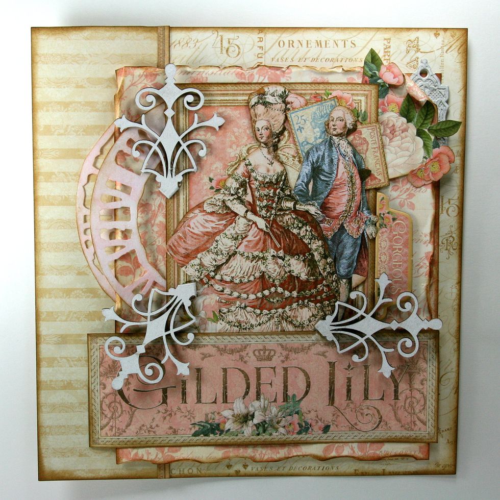 Anchor floral elements with painted chipboard flourishes.