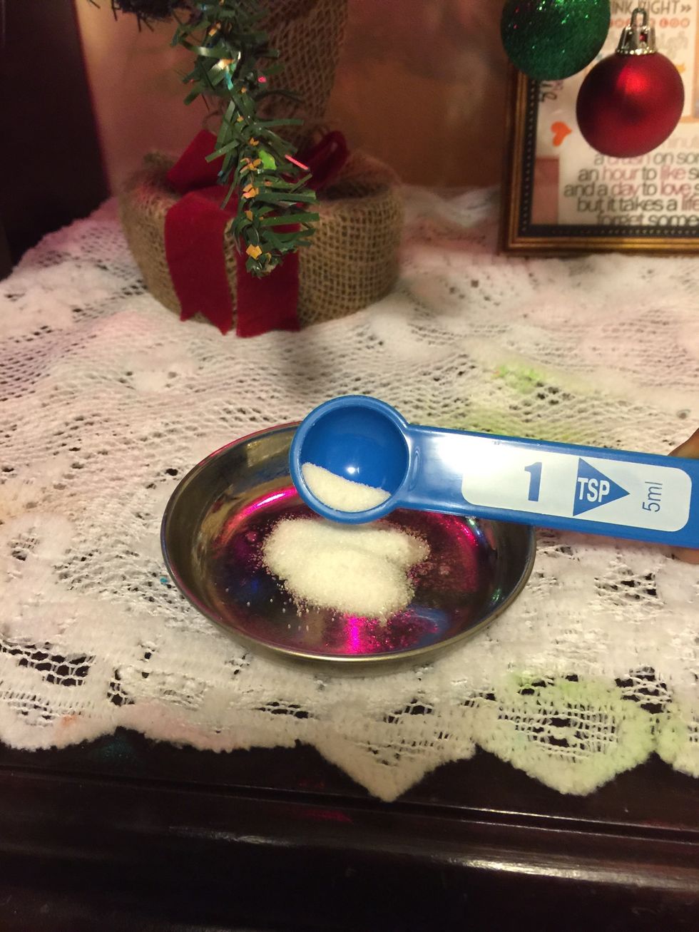 And 1 tbs of sugar into a small dish. Sugar acts as an exfoliant. To exfoliate your face and give it that natural glow.