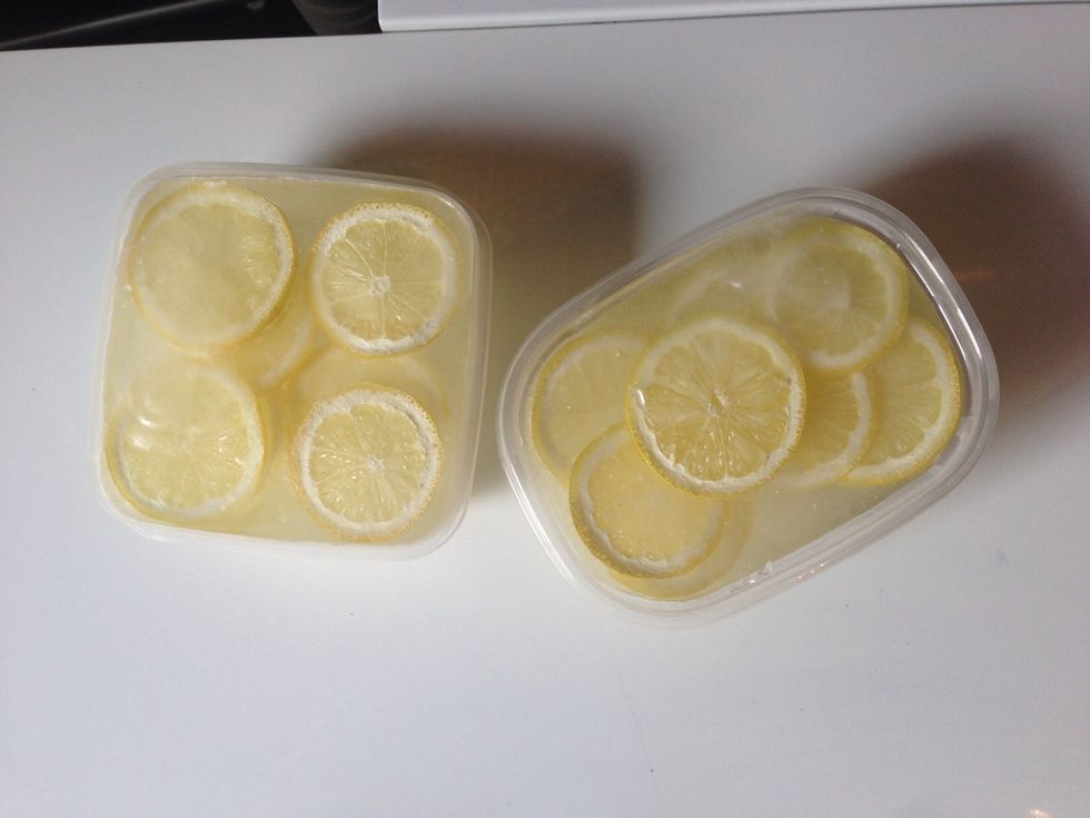 ...and 24 hours later, you will have giant, fancy lemon ice cubes. When you're ready to make your drink, take the cubes out of the freezer so they have a few minutes to loosen up.
