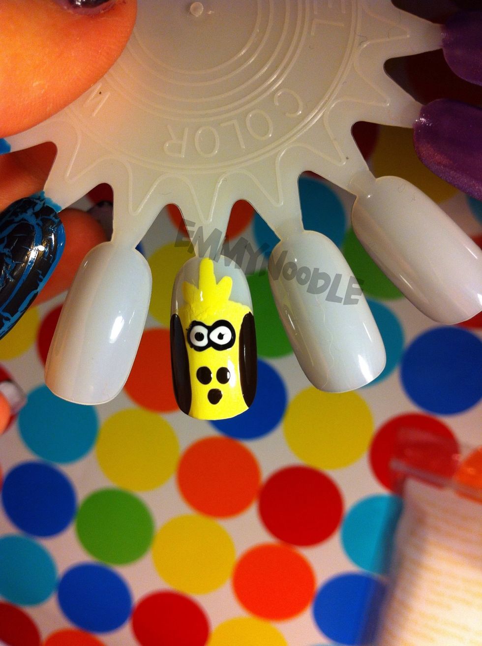 And a black dot inside of the white to finish his eyes.