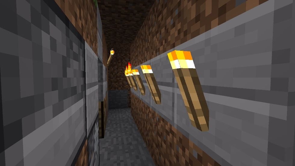 And add a wall full of torches inside it