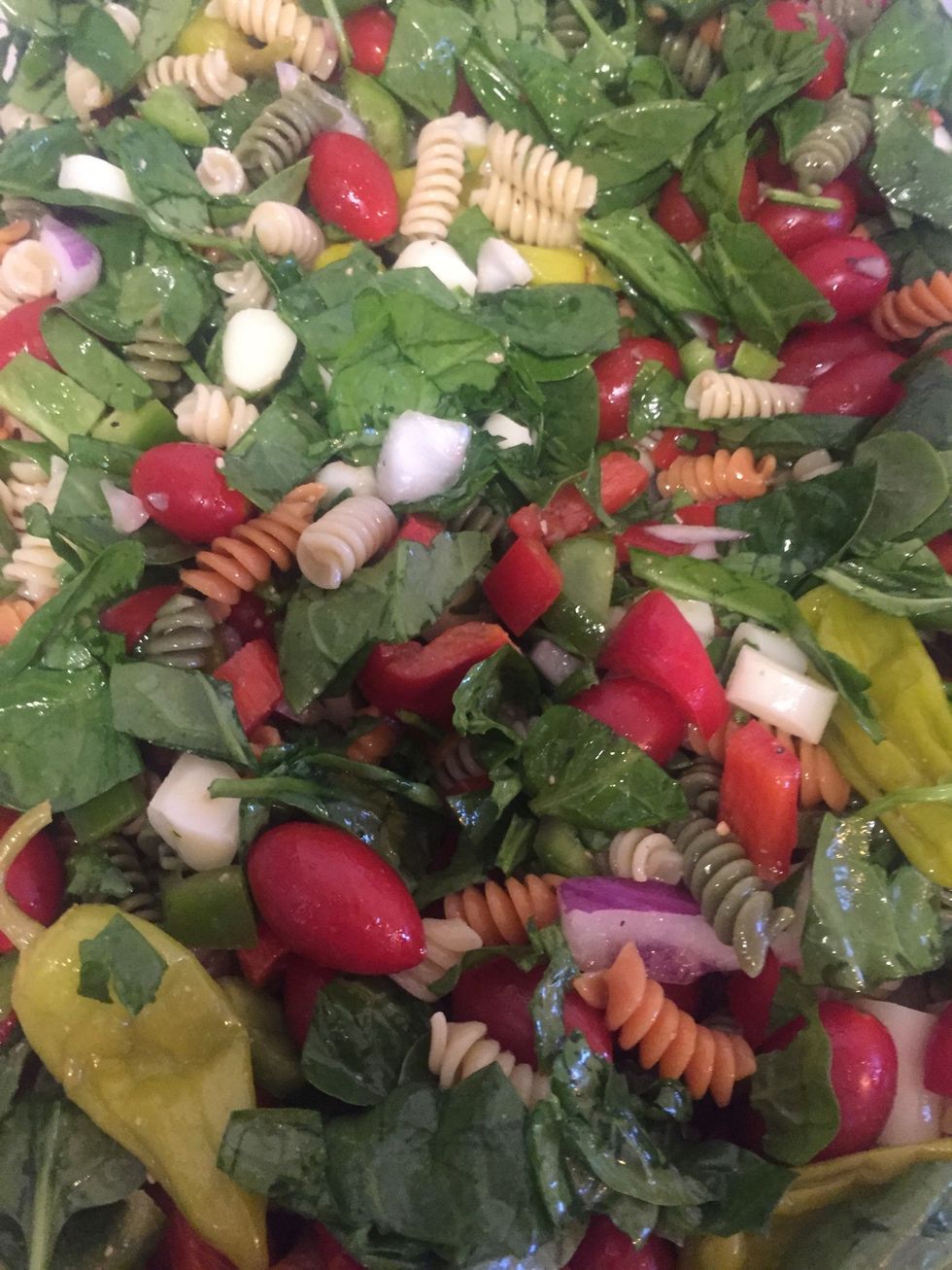 And add about three tablespoonfuls of the dressing to the pasta