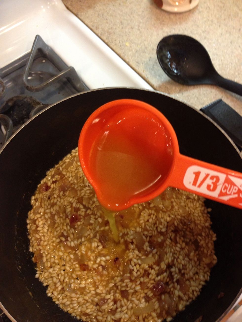 ... And add it! You will need to add about a cup worth, enough to cover the rice in liquid.