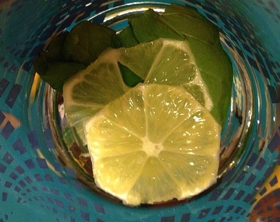 ..and add them to a glass with the lemon.