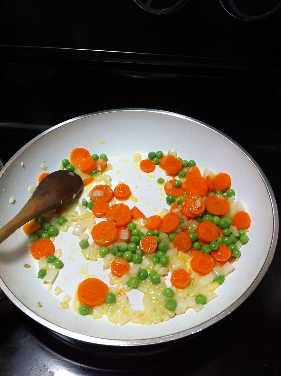 And add whatever veggies you like in your sauce. I usually stick to onions, garlic, carrots, peas, sometimes corn or peppers. Or for more adult tastes olives, capers, wine... Saut\u00e9e until tender