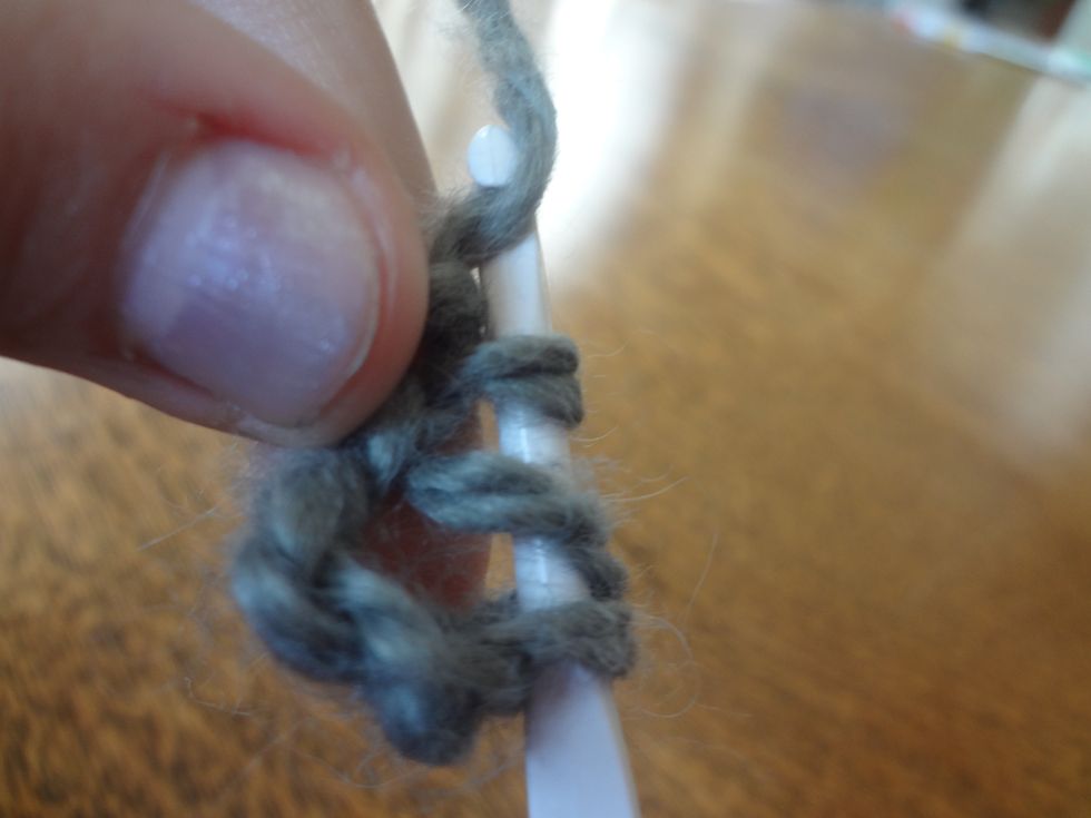 And again, wrap the yarn around the needle...